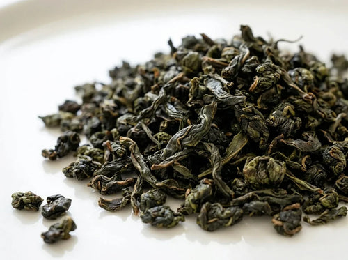 Cloudline Green whole-leaf green tea — dry whole leaves, close-up