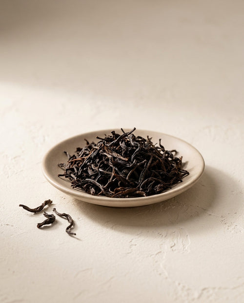 Cloudline single-serve whole-leaf tea — loose leaves in a ceramic dish
